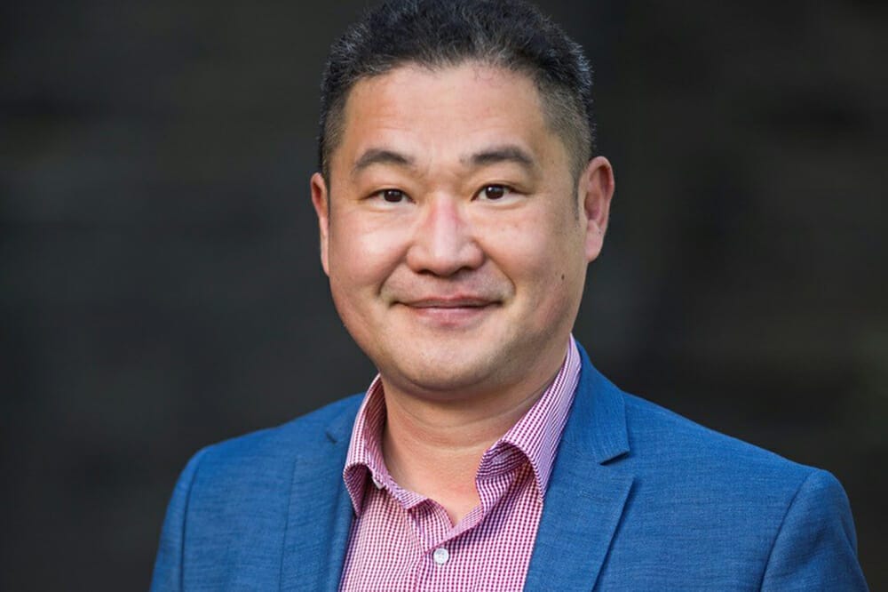 Professor Mingguang He