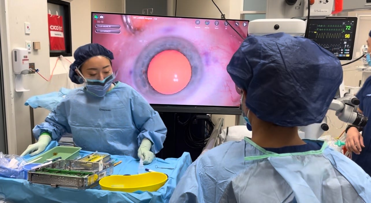 Surgical theatre showing Alcon Ngenuity 3D visualisation system in use.