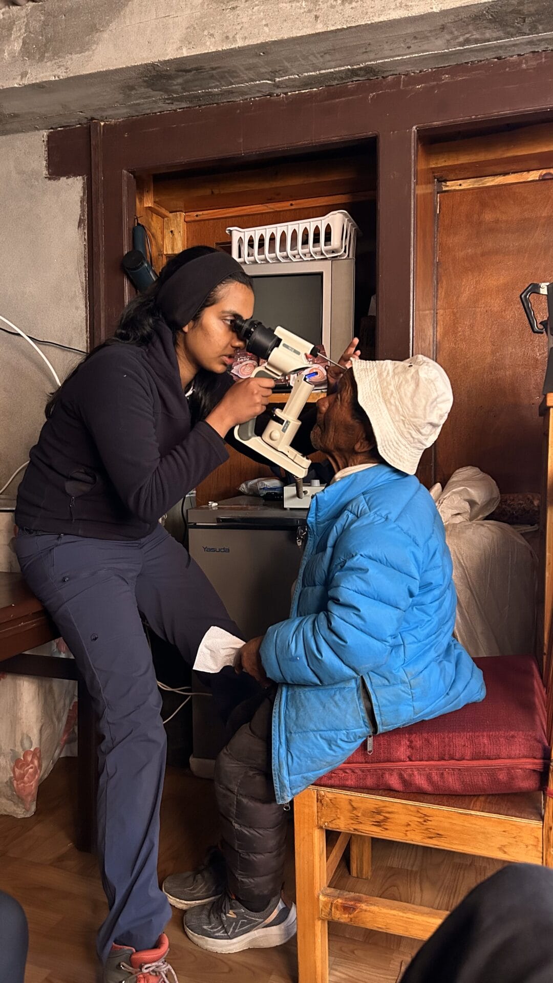 IMG_7179 woman testing a person's eyes at Eyes4Everest eye clinic