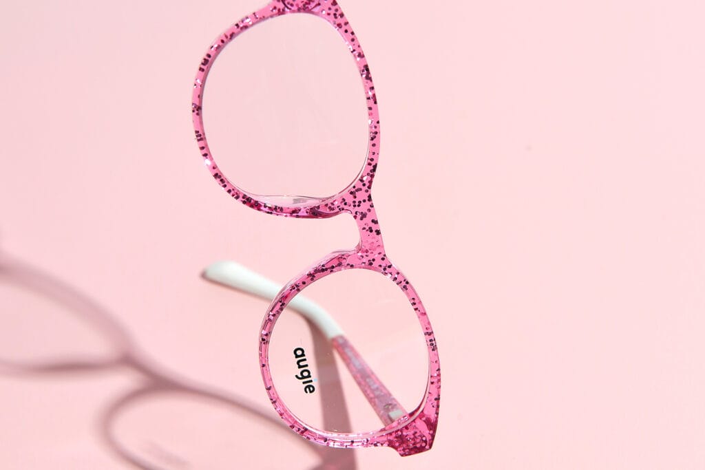 pink augie eyewear frames against a pink background