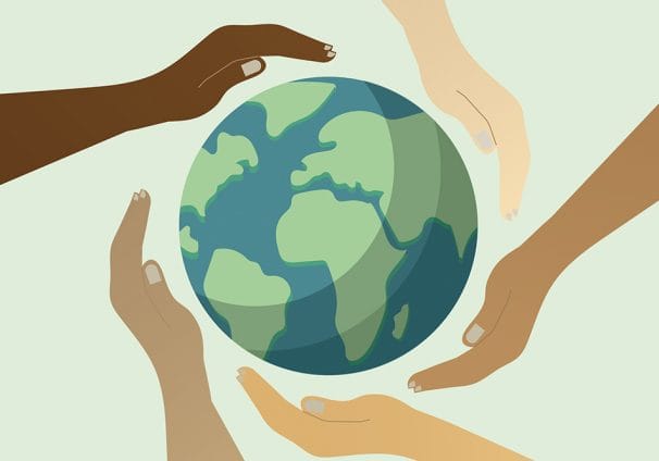 Graphic of hands around a picture of a globe.