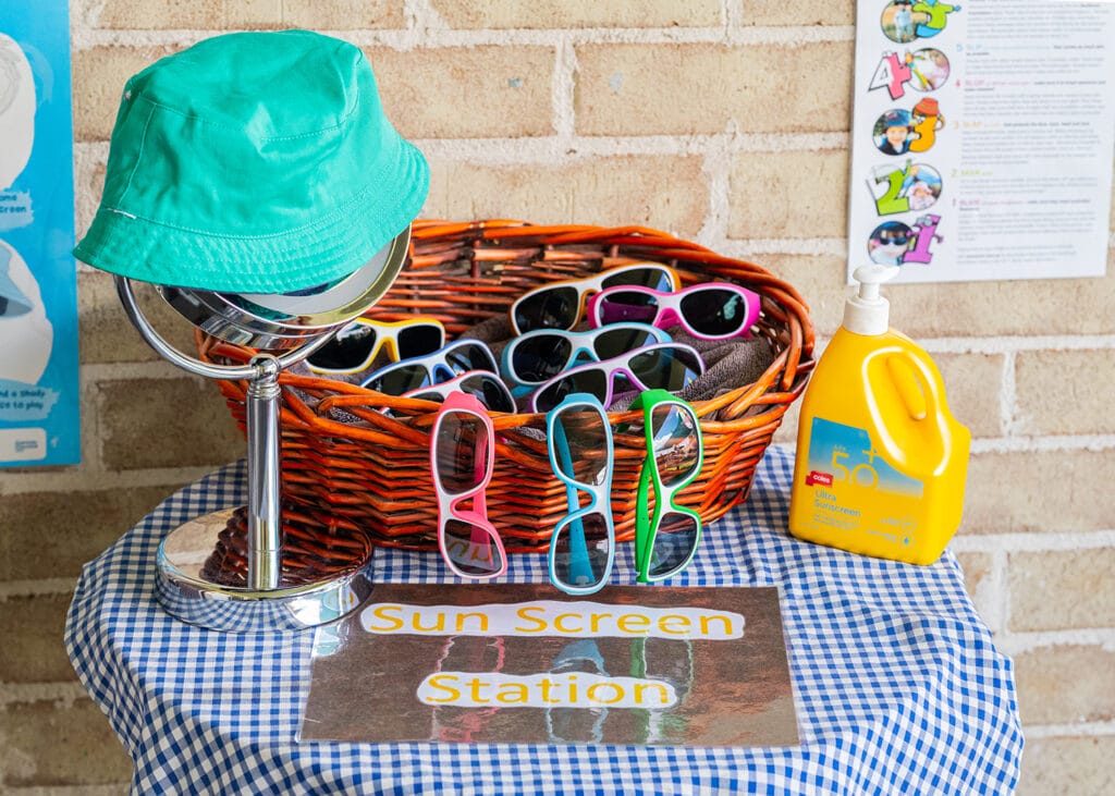 basket with lots of beamers frames, sunhats and sunscreen. 