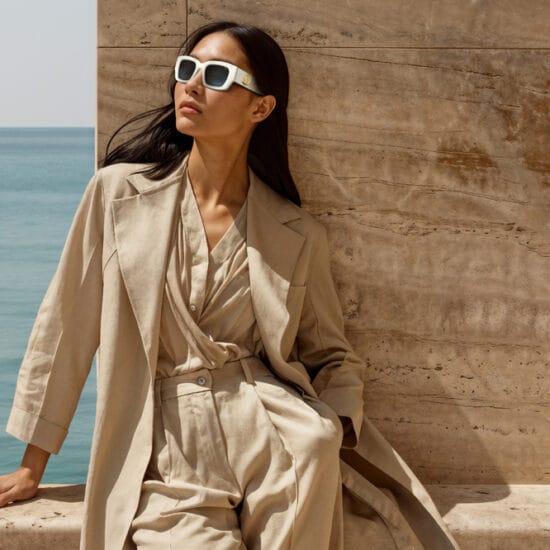 woman wearing INVU Fashionista Edition against the backdrop of the ocean
