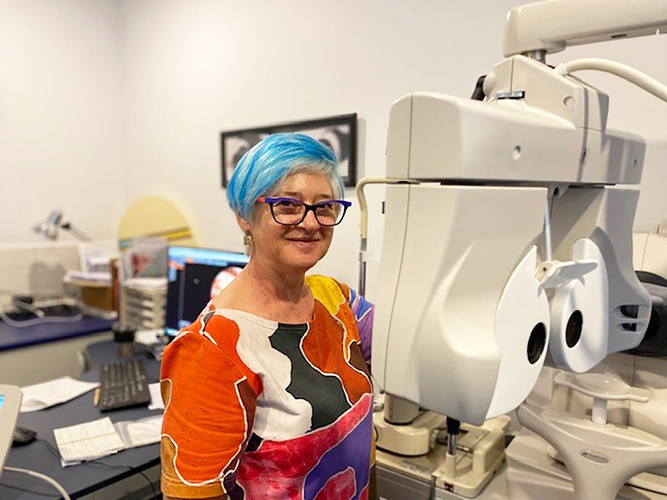 Jenny Spicer standing in her clinic - she uses SightScore with her patients