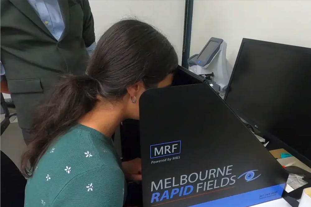 Image shows child using Melbourne Rapid Fields device