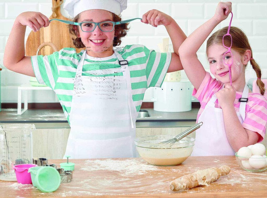 Children cooking and wearing nano vista frames