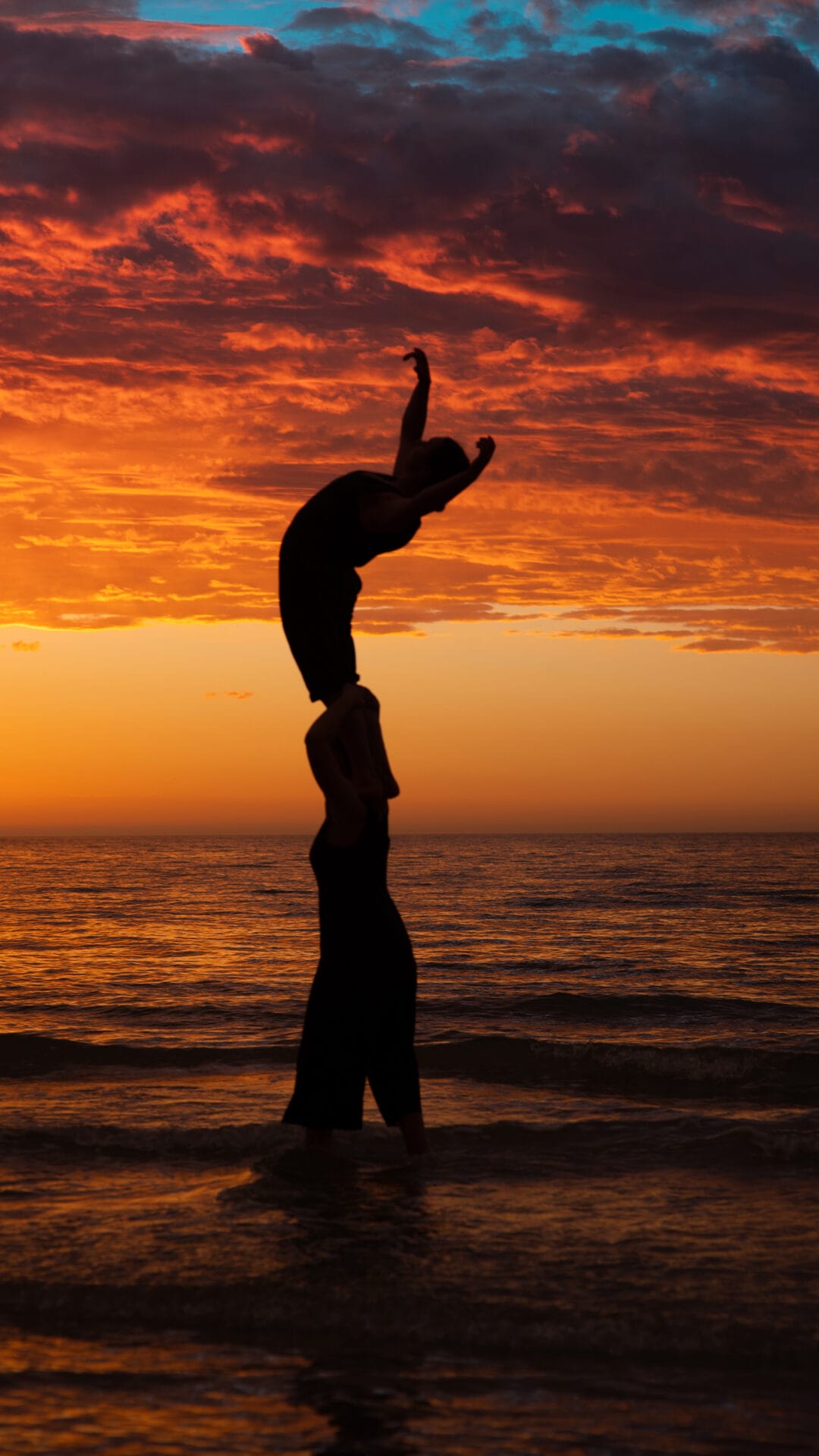 Image shows two people dancing at sunset. An image from the short film Short - Sighted, part of The Other Film Festival, Two Degrees and Arts Access Victoria. Taken by Jordan Reynolds.
