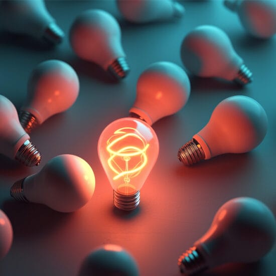 Single light globe that is lit surrounded by unlit lightbulbs to illustrate practice differentiation