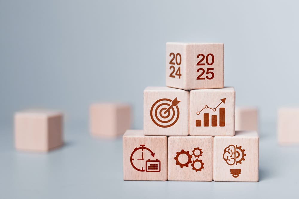 Play block with financial figures on them representing preparing for EOFY success