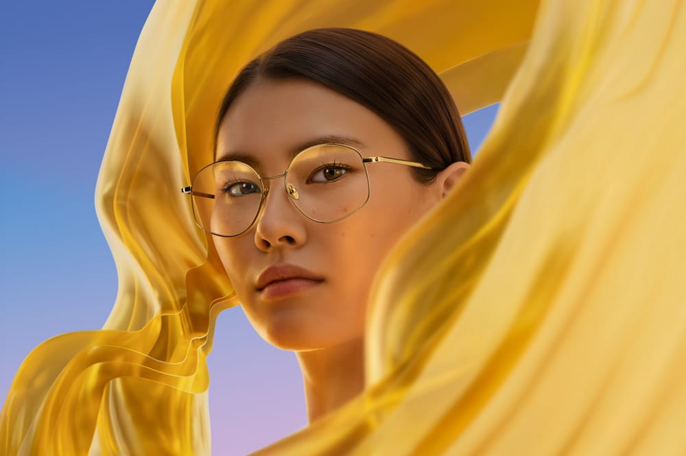 product shot of woman wearing glasses with lens coatings