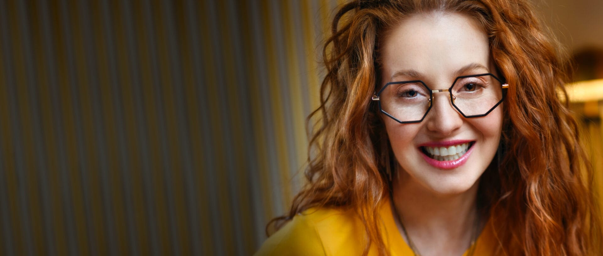 woman wearing glasses with Glacier Expression by Shamir lens coatings