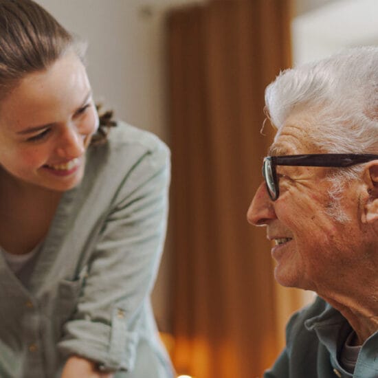 Woman providing support to love vision patient via SeeWay