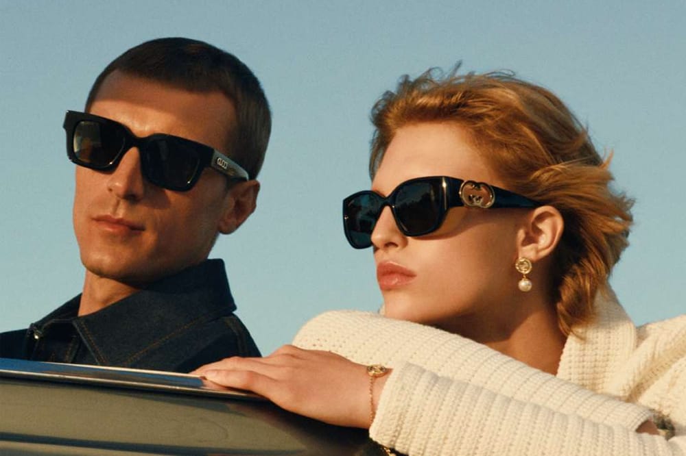 Couple in Gucci sunglasses