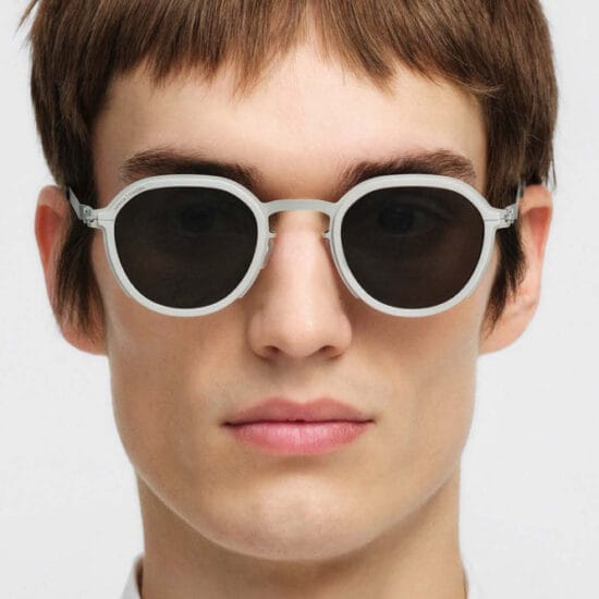 Mykita/Rimowa frames on someone's face