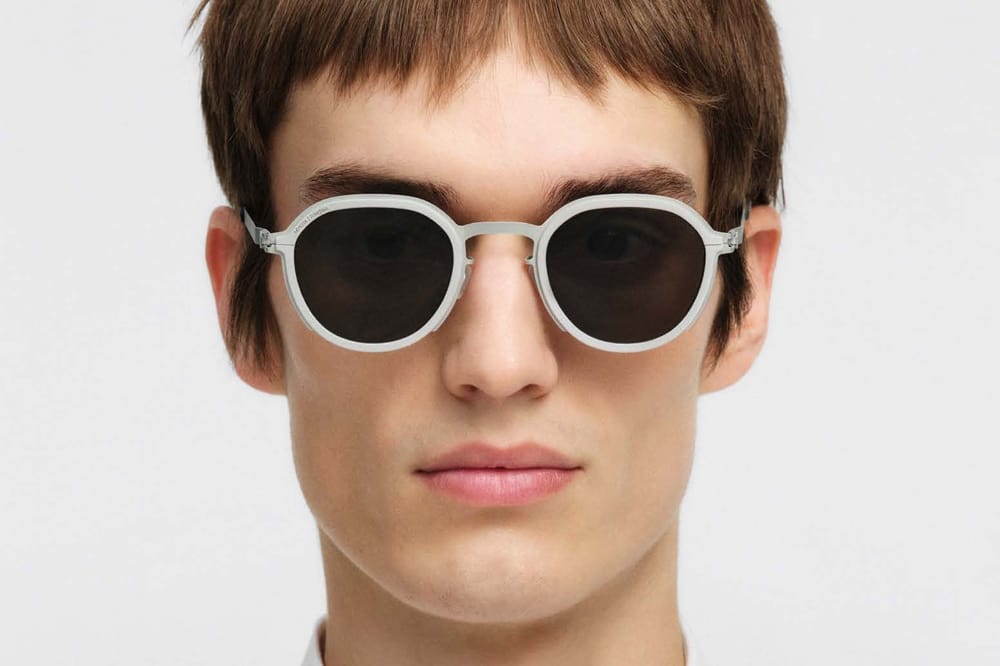 Mykita/Rimowa frames on someone's face