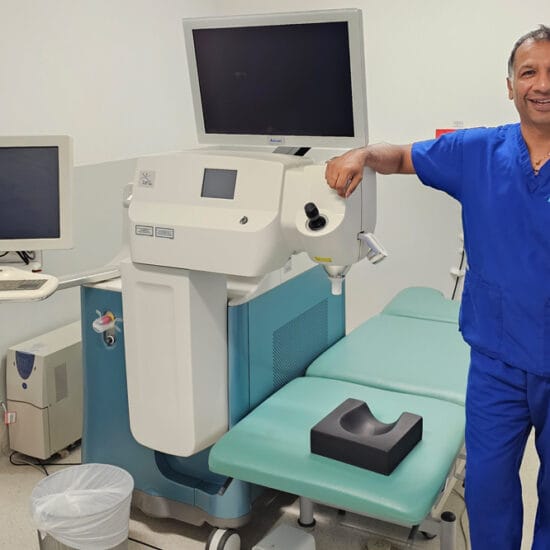 Associate Professor Rob Paul with the LenSx FLACS system.