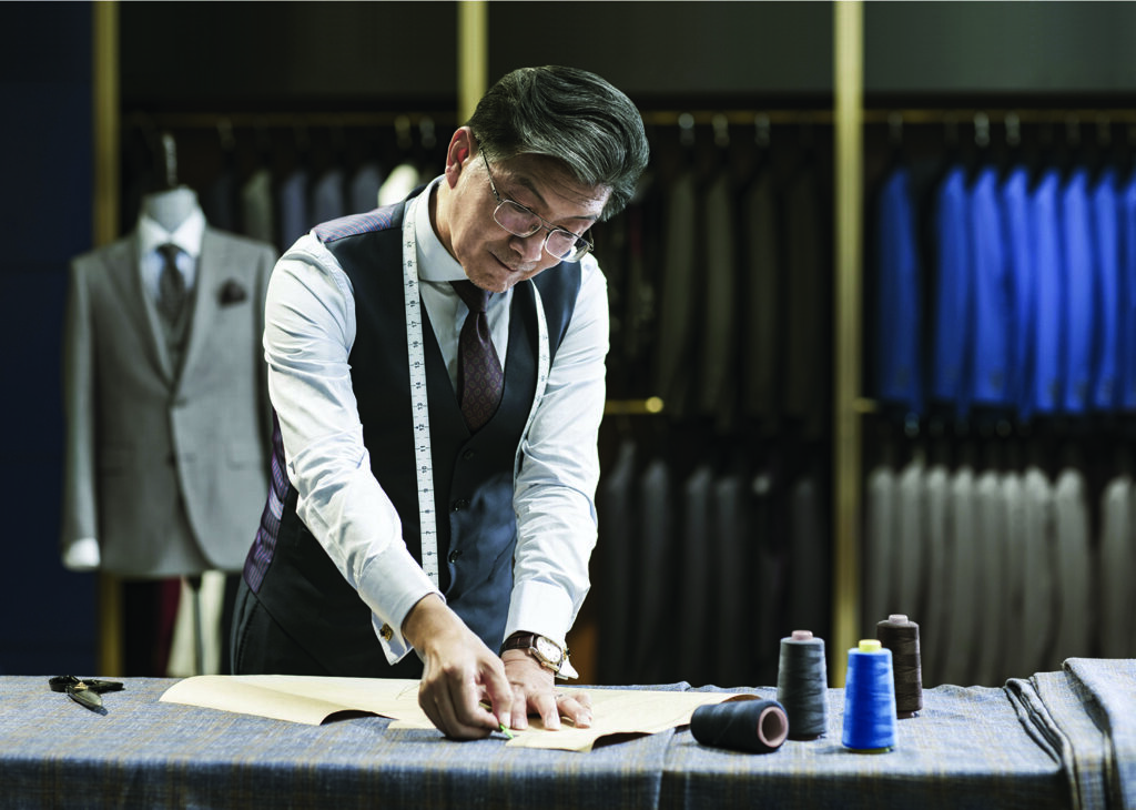 Tailor with glasses
