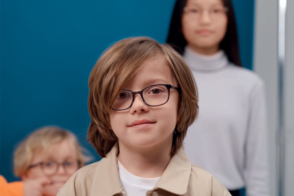 Boy wearing glasses for myopia management