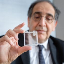 Professor José-Alain Sahel with the wireless retinal implant.