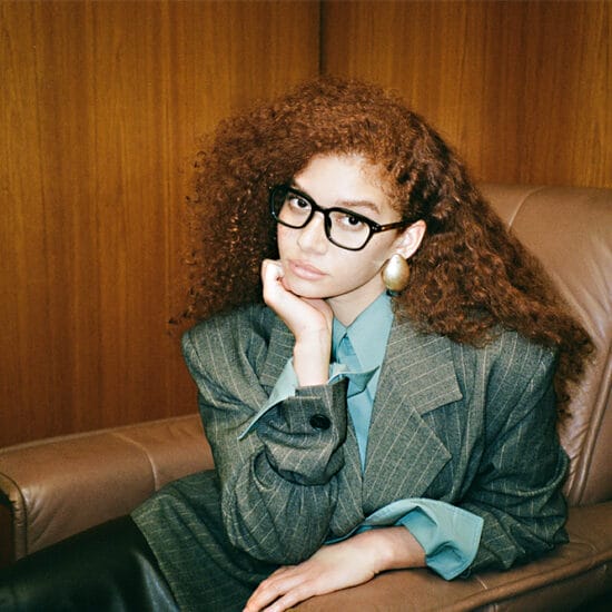 woman wearing Linda Farrow eyewear