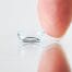 Toric contact lens on finger