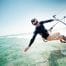 Man kitesurfing with sports eyewear